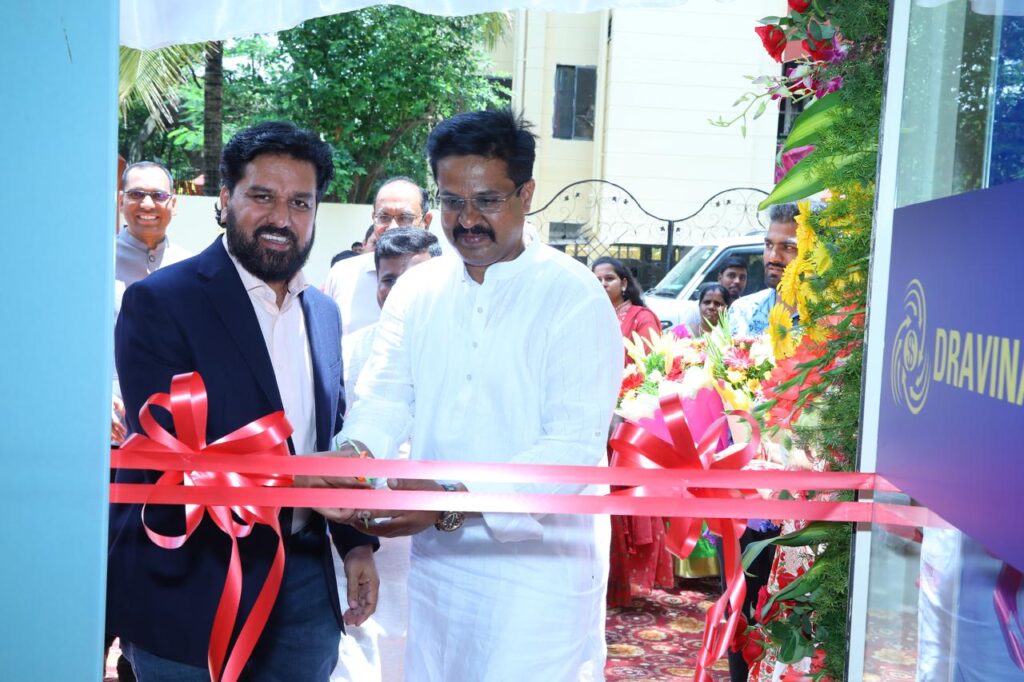 Ribbon cutting, handshake, team photo with the CEO